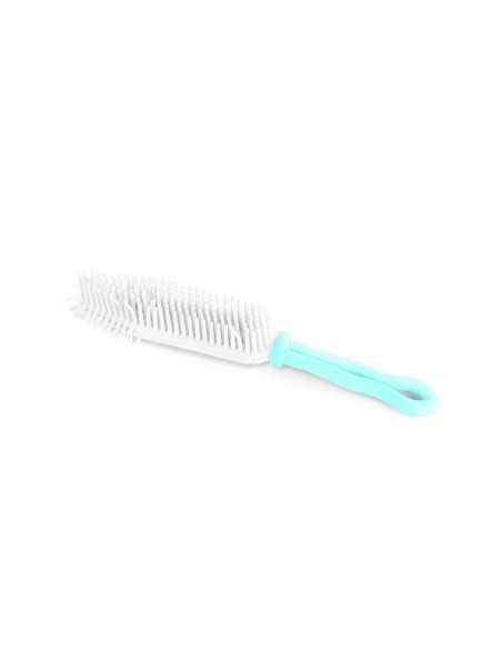 Pet and fabric hair capture brush with rubber bristles